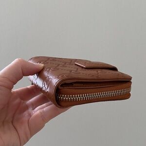 Gucci Guccissima GG monogram Tan Brown Embossed Leather Bi-fold Compact Wallet